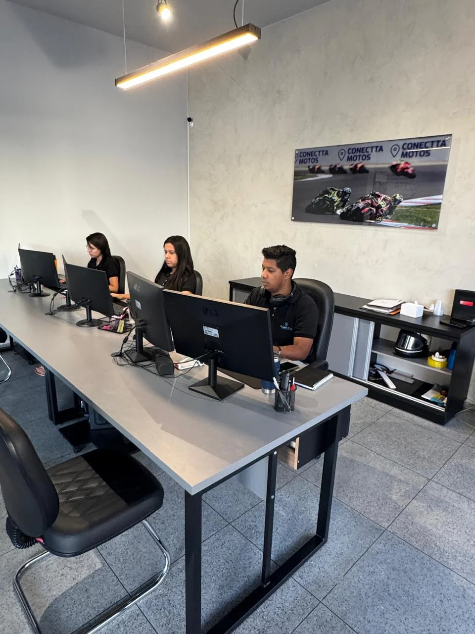 Equipe de atendimento da Conectta Motos